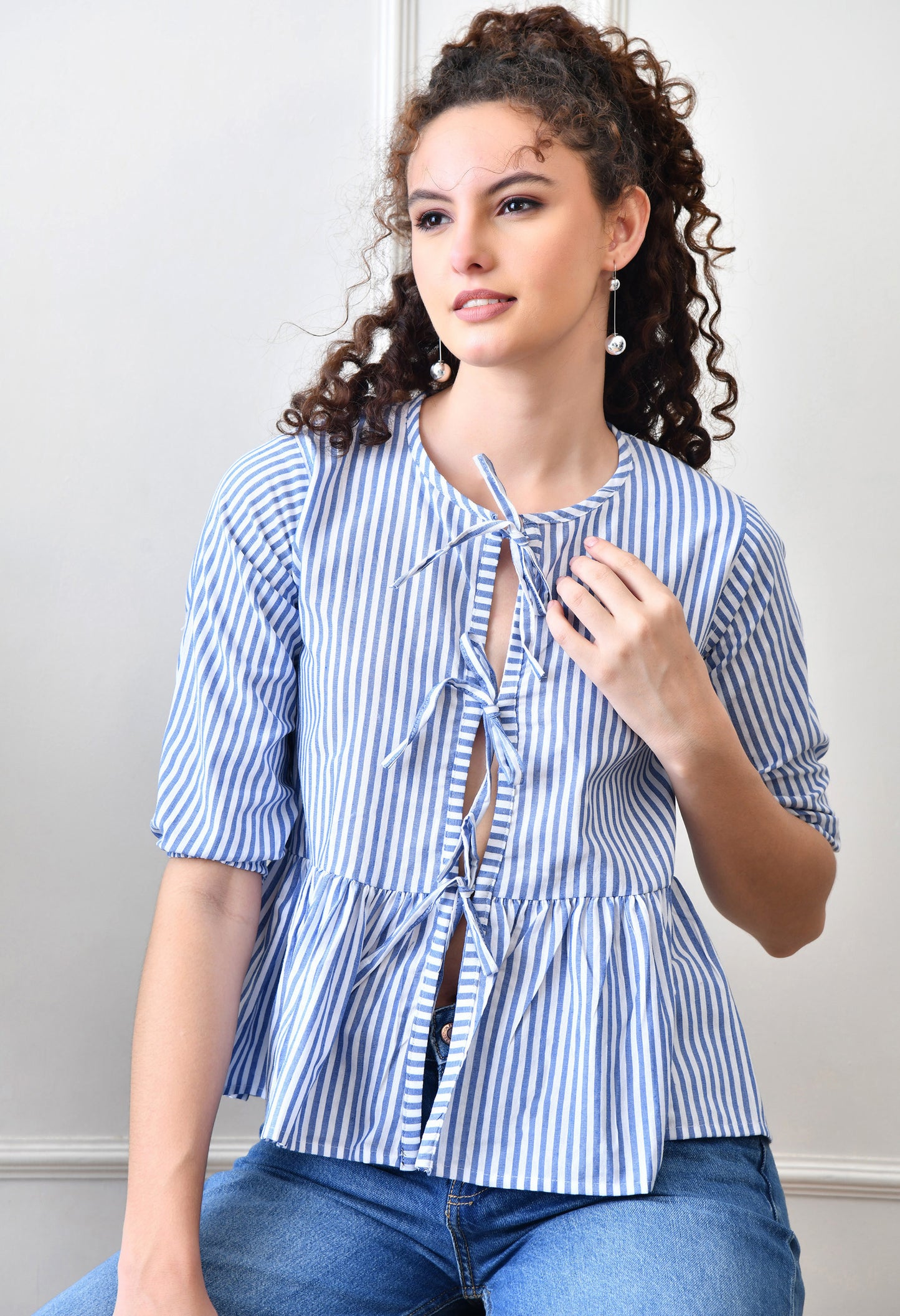 The Chicaboo Tie-Up Peplum Top in Blue Stripes